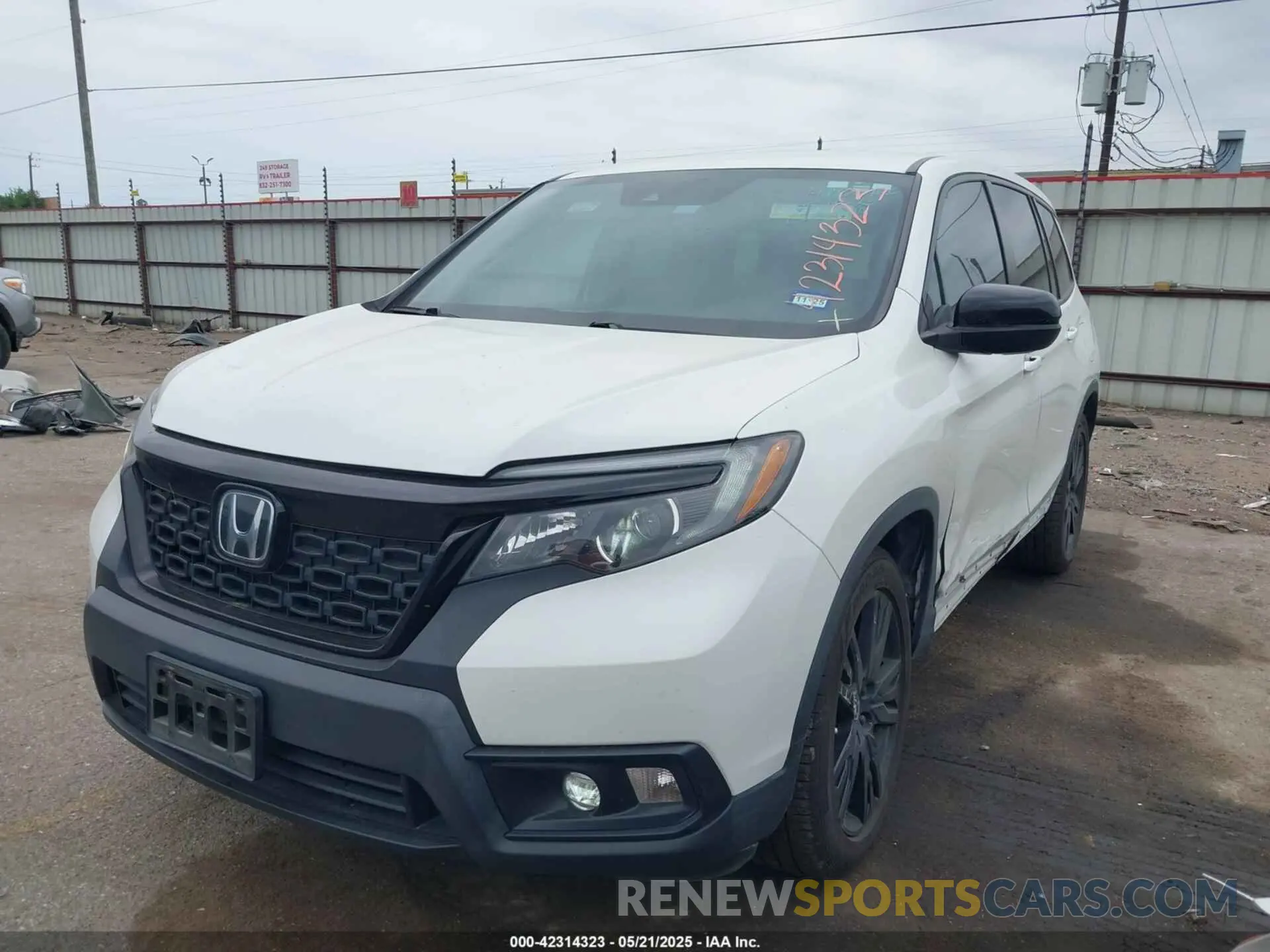 2 Photograph of a damaged car 5FNYF7H23MB002963 HONDA PASSPORT 2021