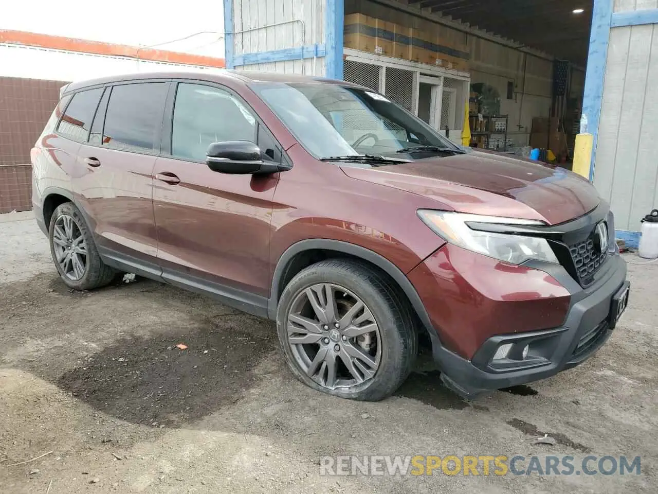 4 Photograph of a damaged car 5FNYF7H52MB005850 HONDA PASSPORT 2021