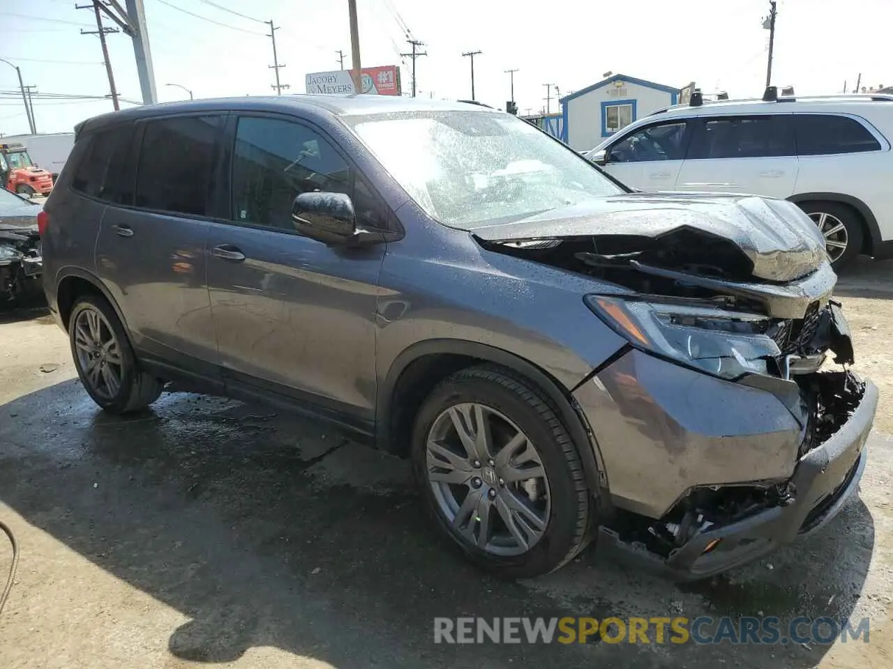 4 Photograph of a damaged car 5FNYF7H58MB004010 HONDA PASSPORT 2021