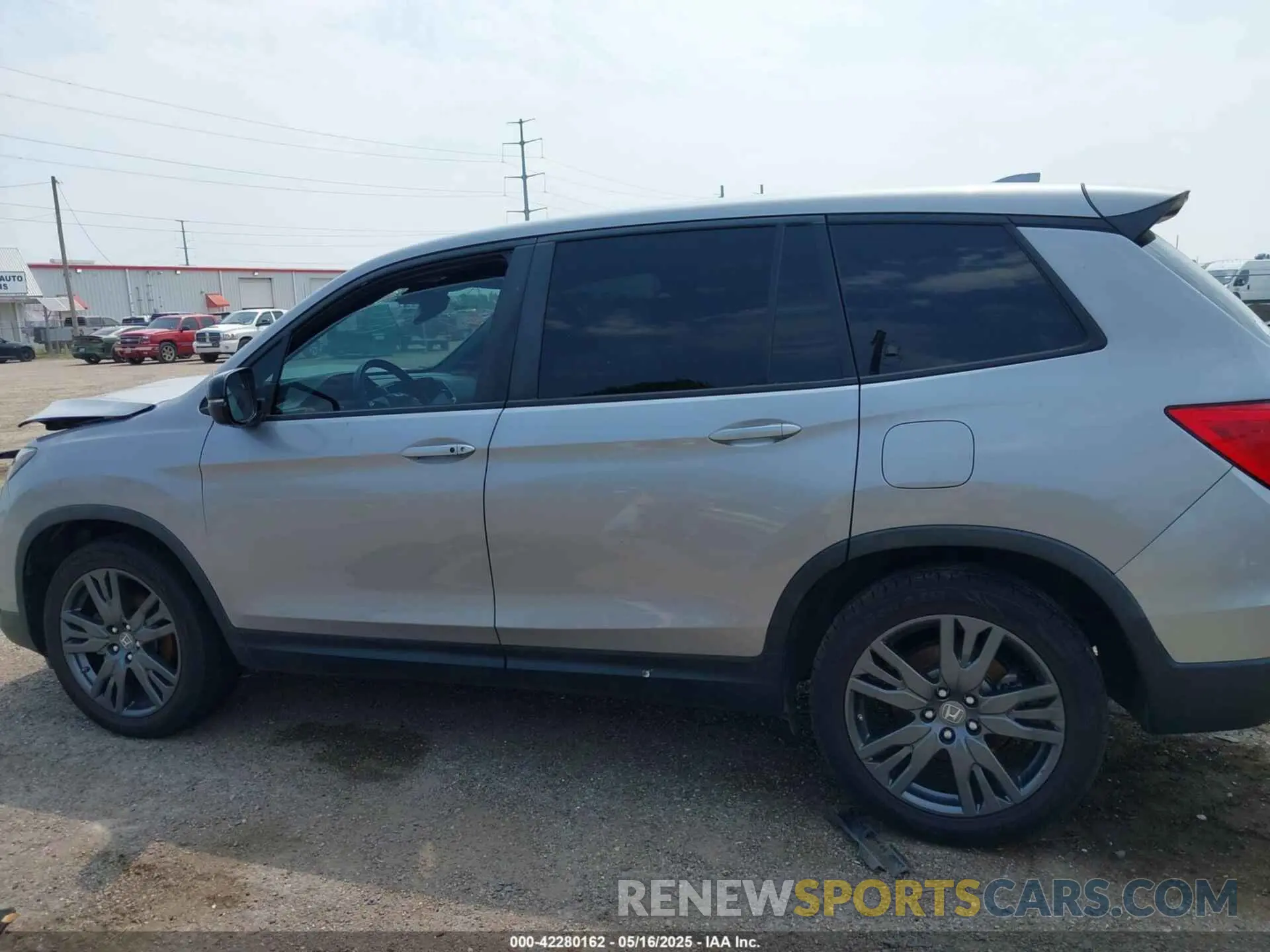 14 Photograph of a damaged car 5FNYF7H59MB007174 HONDA PASSPORT 2021