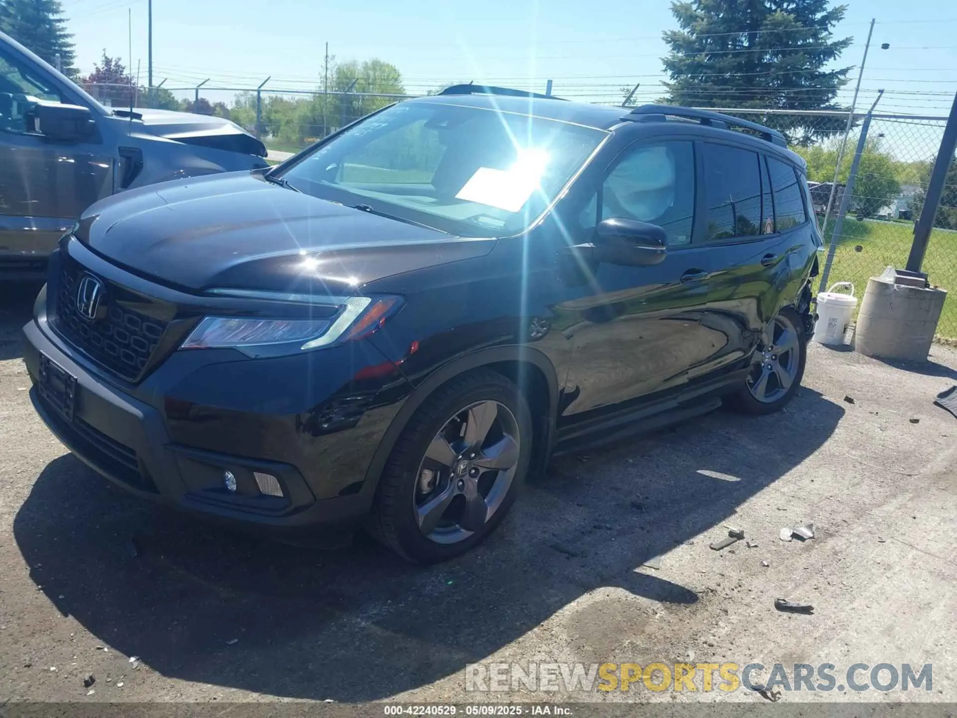 2 Photograph of a damaged car 5FNYF7H92MB010789 HONDA PASSPORT 2021