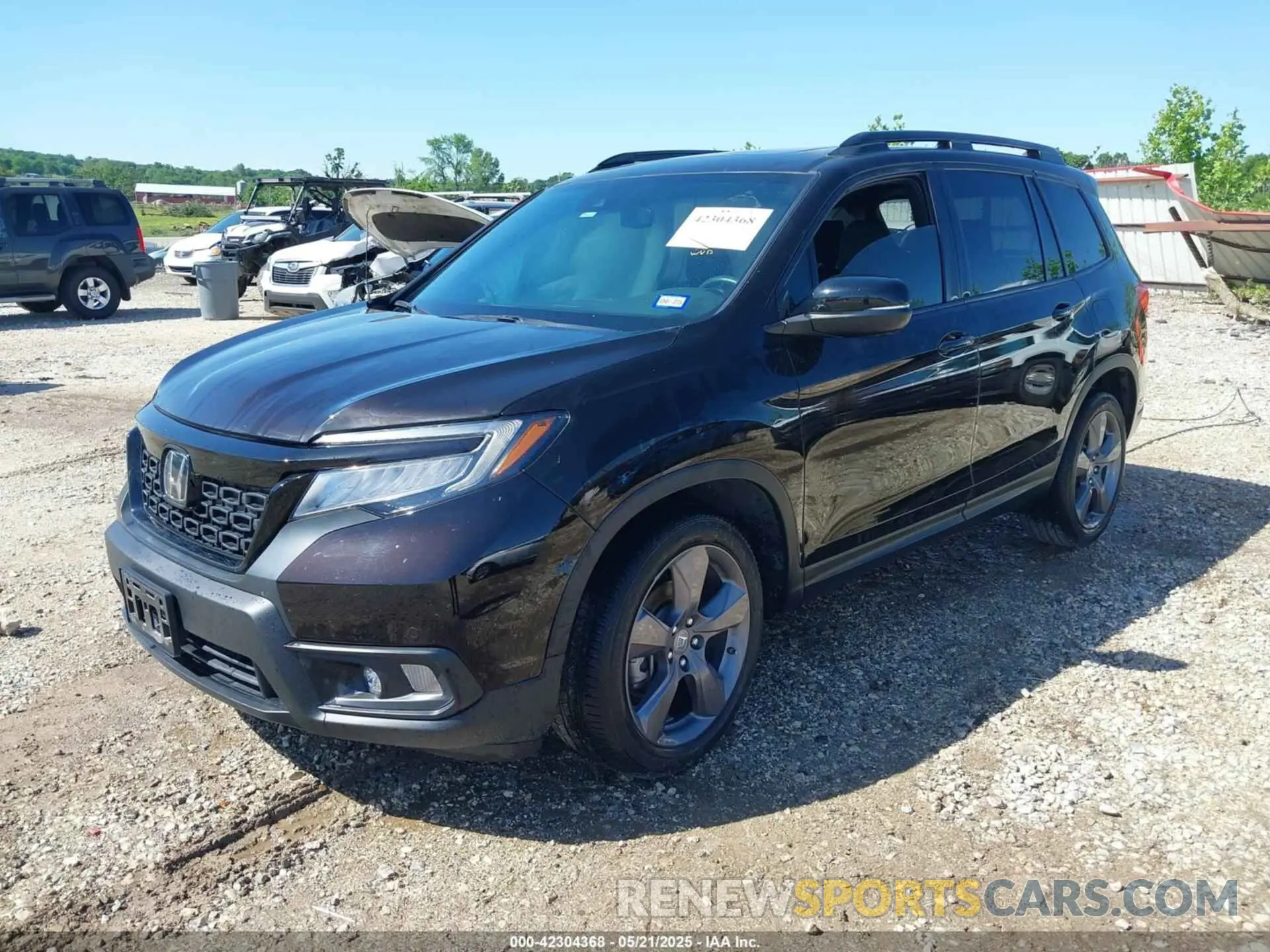 2 Фотография поврежденного автомобиля 5FNYF7H98MB007542 HONDA PASSPORT 2021