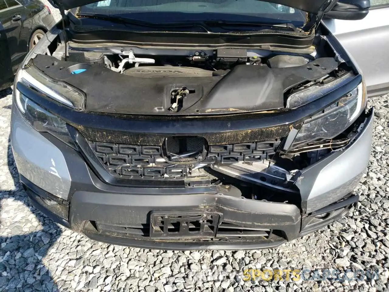 12 Photograph of a damaged car 5FNYF8H27MB003085 HONDA PASSPORT 2021