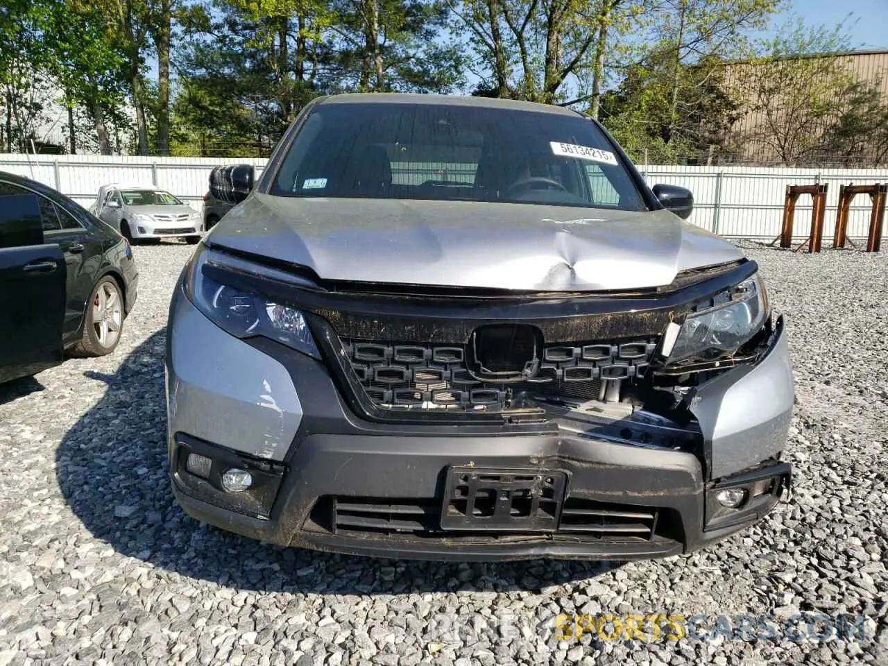 5 Photograph of a damaged car 5FNYF8H27MB003085 HONDA PASSPORT 2021