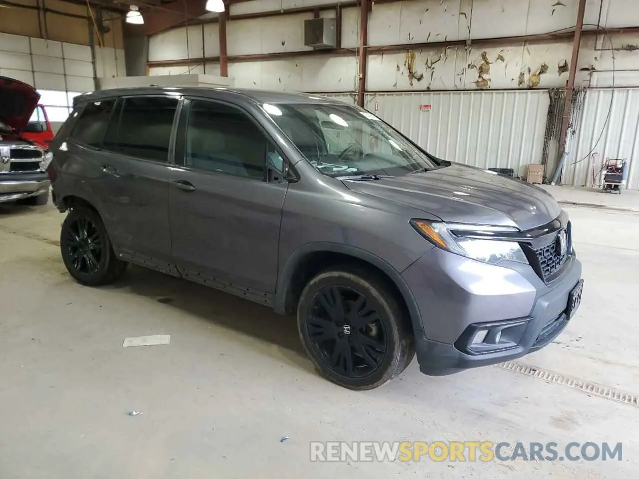 4 Photograph of a damaged car 5FNYF8H27MB003622 HONDA PASSPORT 2021