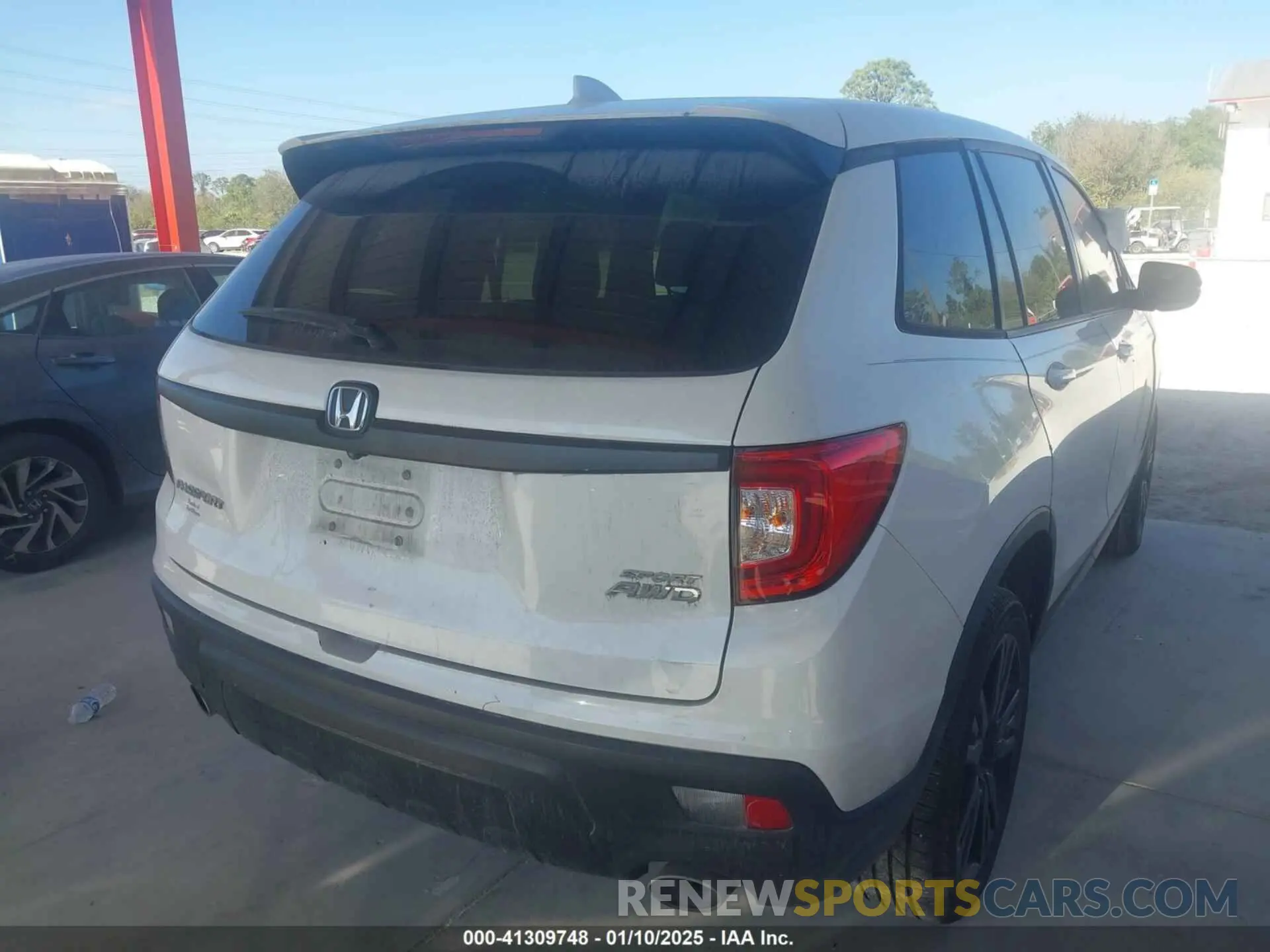 4 Photograph of a damaged car 5FNYF8H29MB001094 HONDA PASSPORT 2021