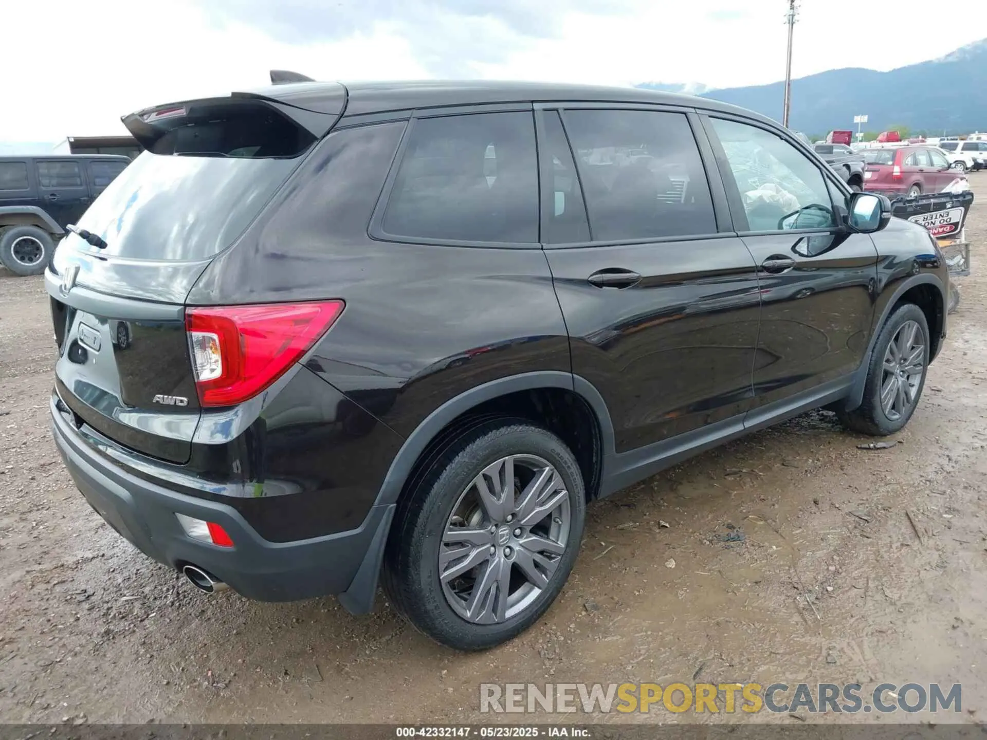 4 Photograph of a damaged car 5FNYF8H51MB019230 HONDA PASSPORT 2021