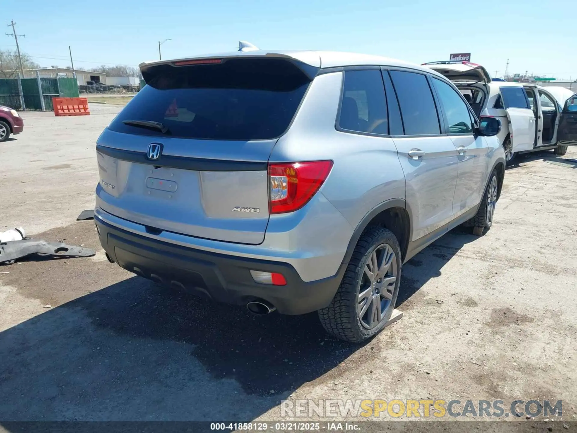 4 Photograph of a damaged car 5FNYF8H51MB024752 HONDA PASSPORT 2021