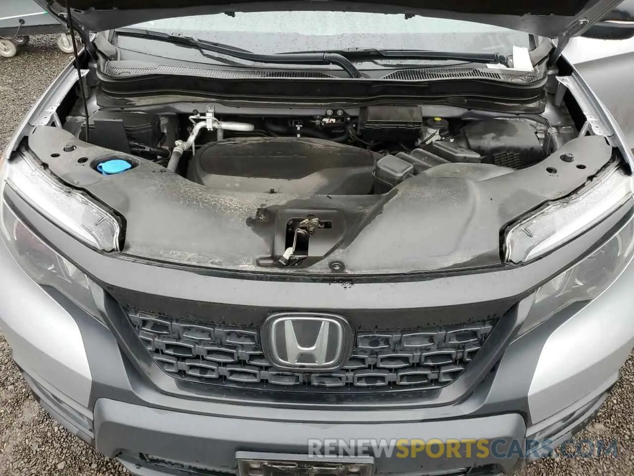 12 Photograph of a damaged car 5FNYF8H53MB040564 HONDA PASSPORT 2021