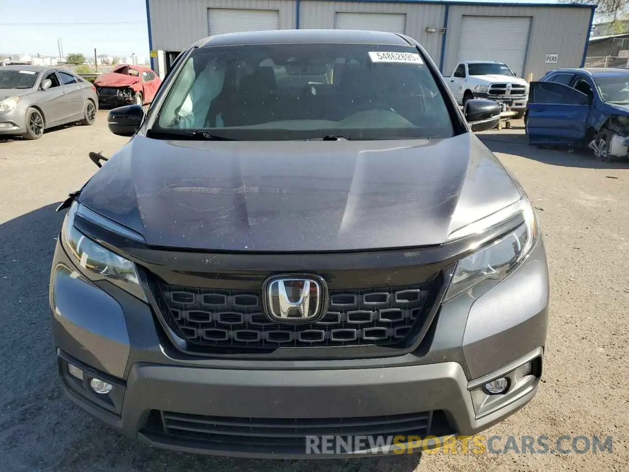 5 Photograph of a damaged car 5FNYF8H56MB032247 HONDA PASSPORT 2021