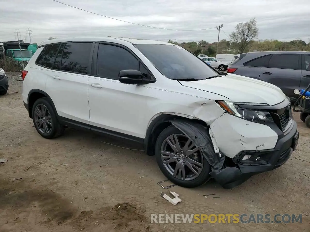 4 Photograph of a damaged car 5FNYF8H57MB007146 HONDA PASSPORT 2021