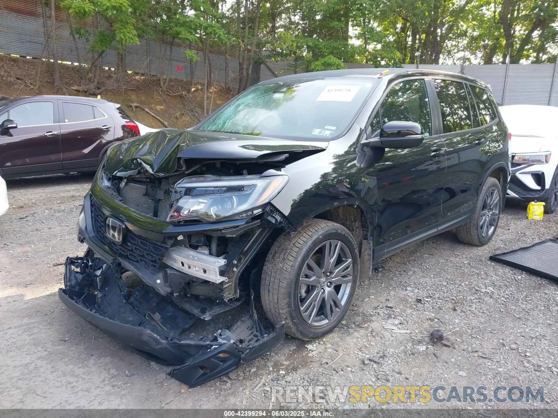 2 Photograph of a damaged car 5FNYF8H57MB022083 HONDA PASSPORT 2021