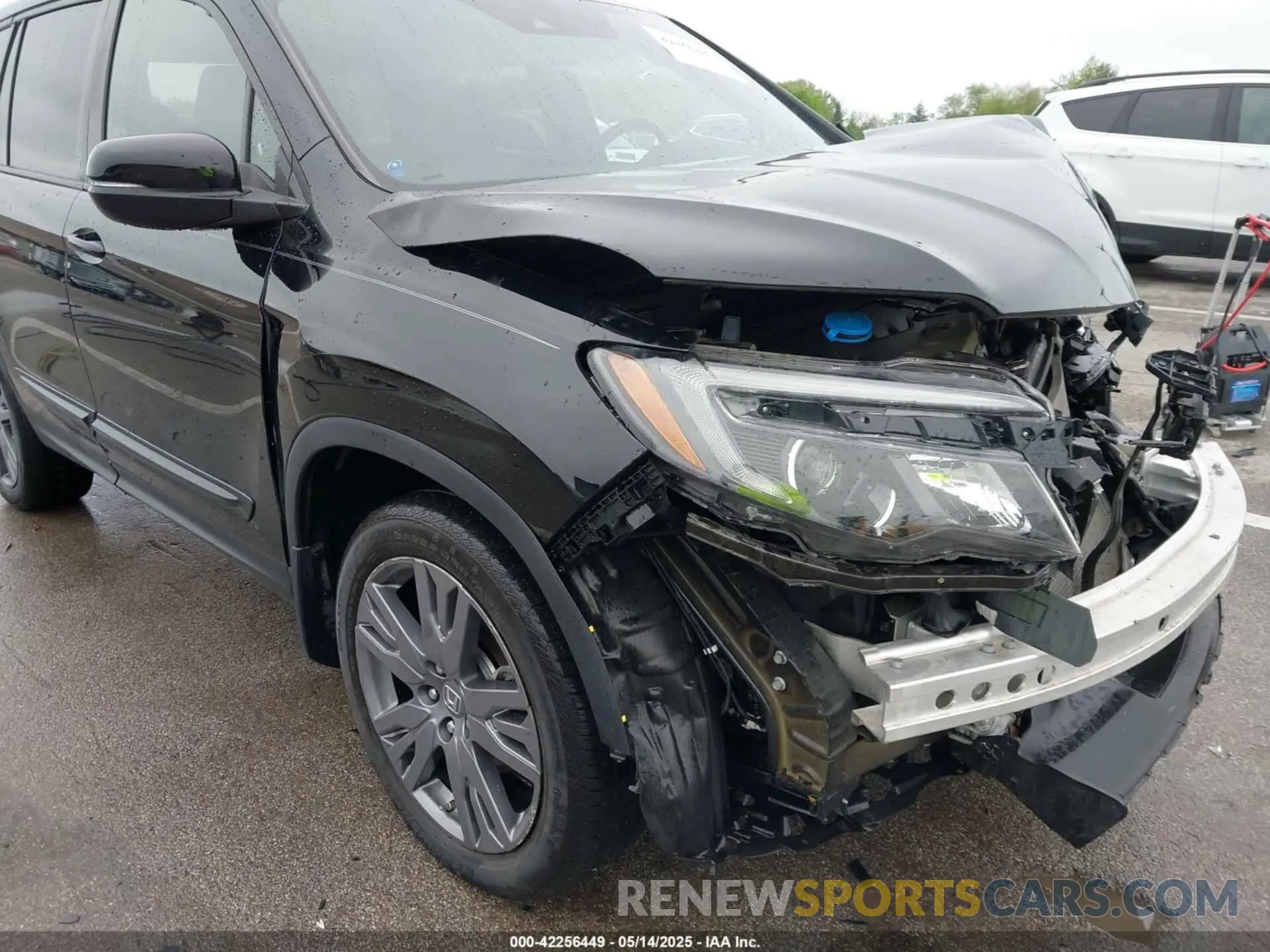 18 Photograph of a damaged car 5FNYF8H58MB013506 HONDA PASSPORT 2021