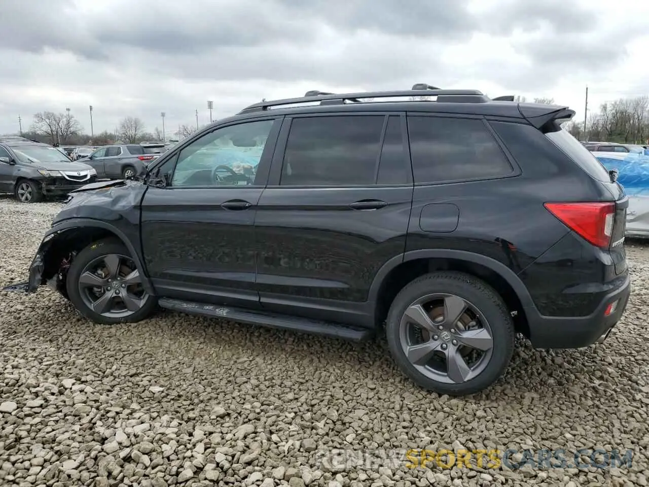 2 Photograph of a damaged car 5FNYF8H91MB009476 HONDA PASSPORT 2021