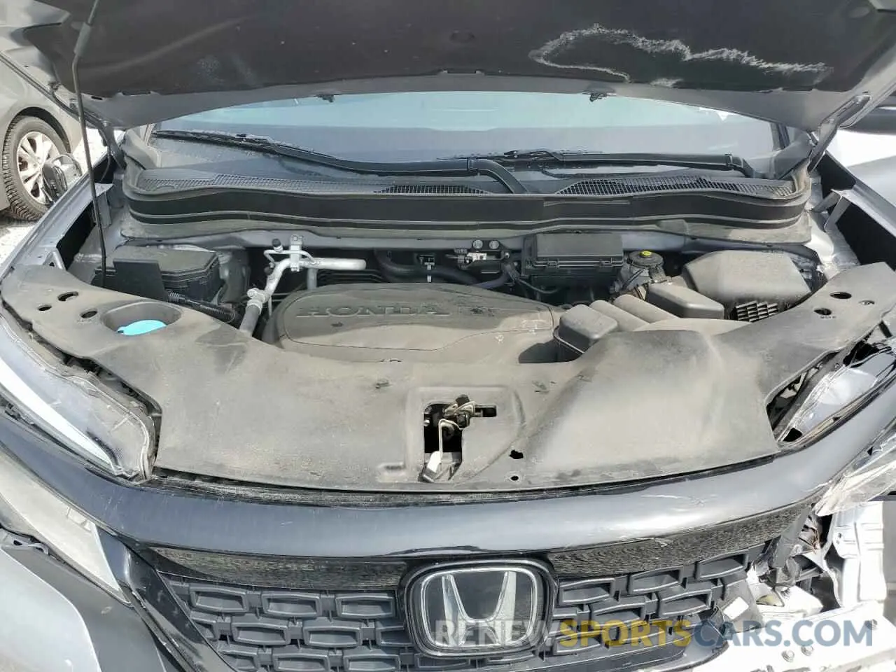 12 Photograph of a damaged car 5FNYF8H95MB040147 HONDA PASSPORT 2021