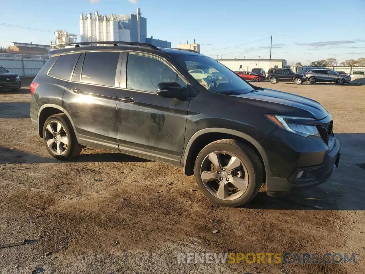 4 Фотография поврежденного автомобиля 5FNYF8H98MB019552 HONDA PASSPORT 2021