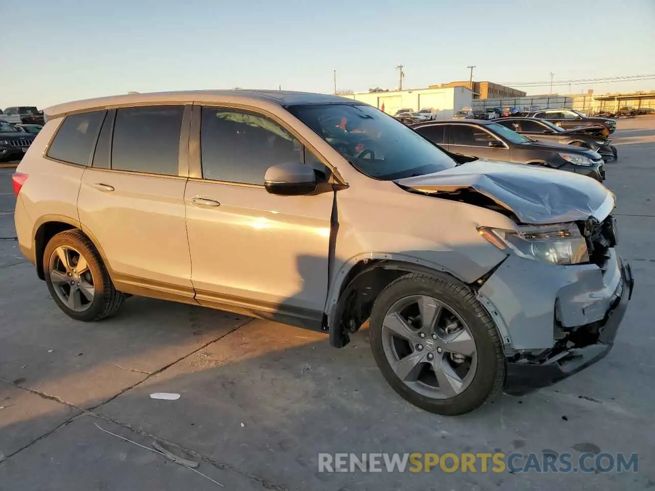 4 Photograph of a damaged car 5FNYF7H5XNB001482 HONDA PASSPORT 2022