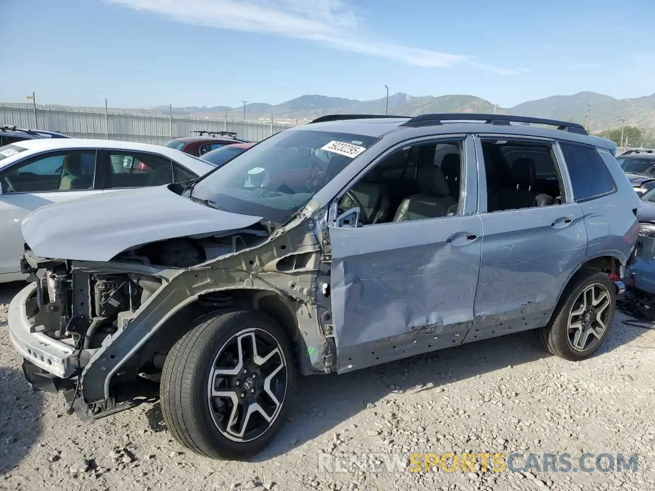 1 Фотография поврежденного автомобиля 5FNYF8H03NB000345 HONDA PASSPORT 2022