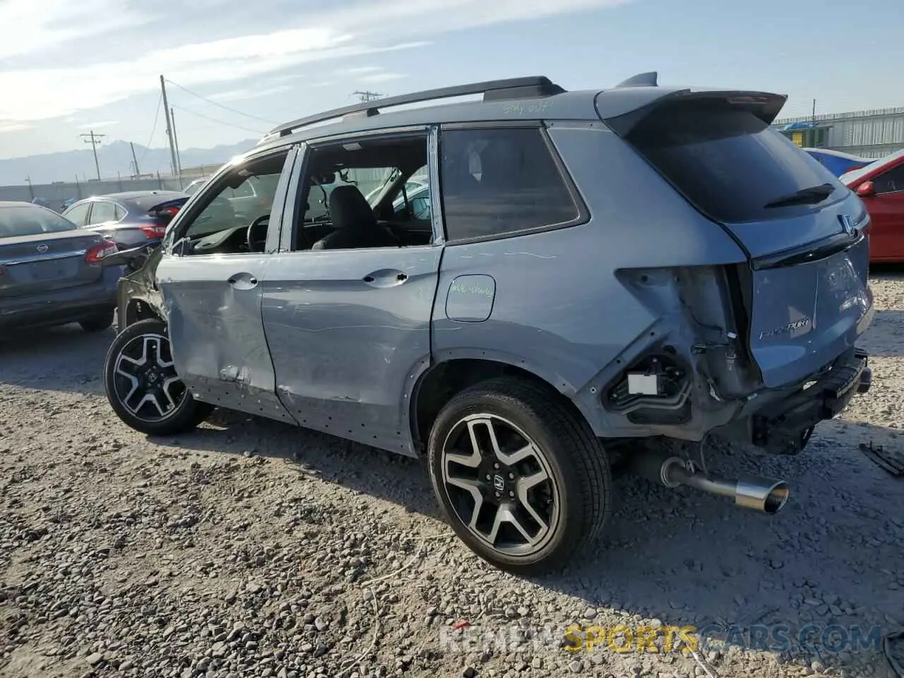 2 Фотография поврежденного автомобиля 5FNYF8H03NB000345 HONDA PASSPORT 2022