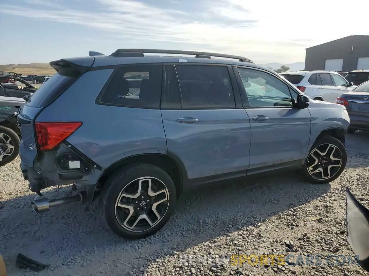 3 Фотография поврежденного автомобиля 5FNYF8H03NB000345 HONDA PASSPORT 2022