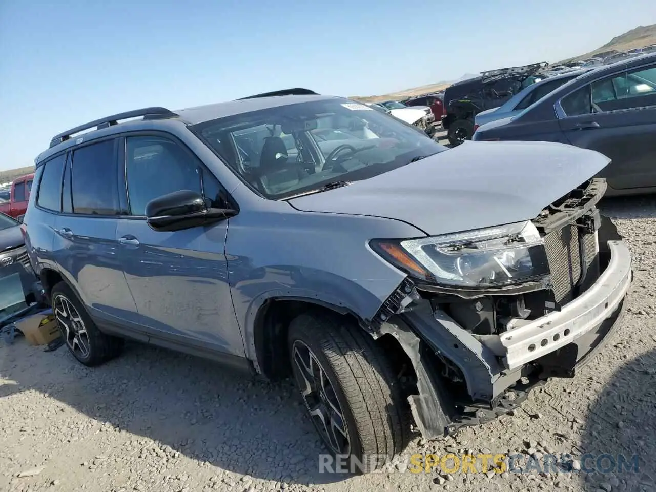 4 Фотография поврежденного автомобиля 5FNYF8H03NB000345 HONDA PASSPORT 2022