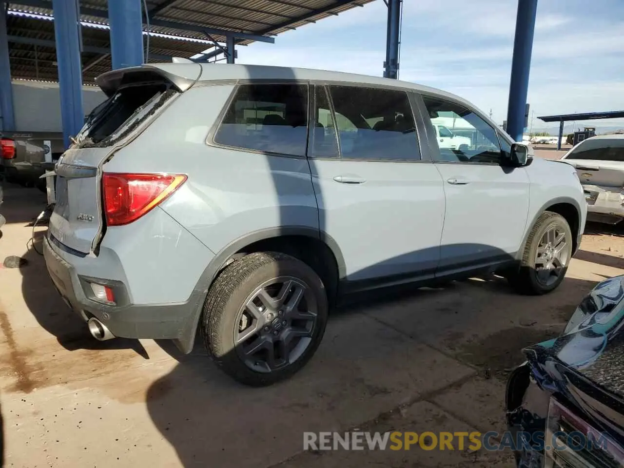 3 Photograph of a damaged car 5FNYF8H53NB007016 HONDA PASSPORT 2022