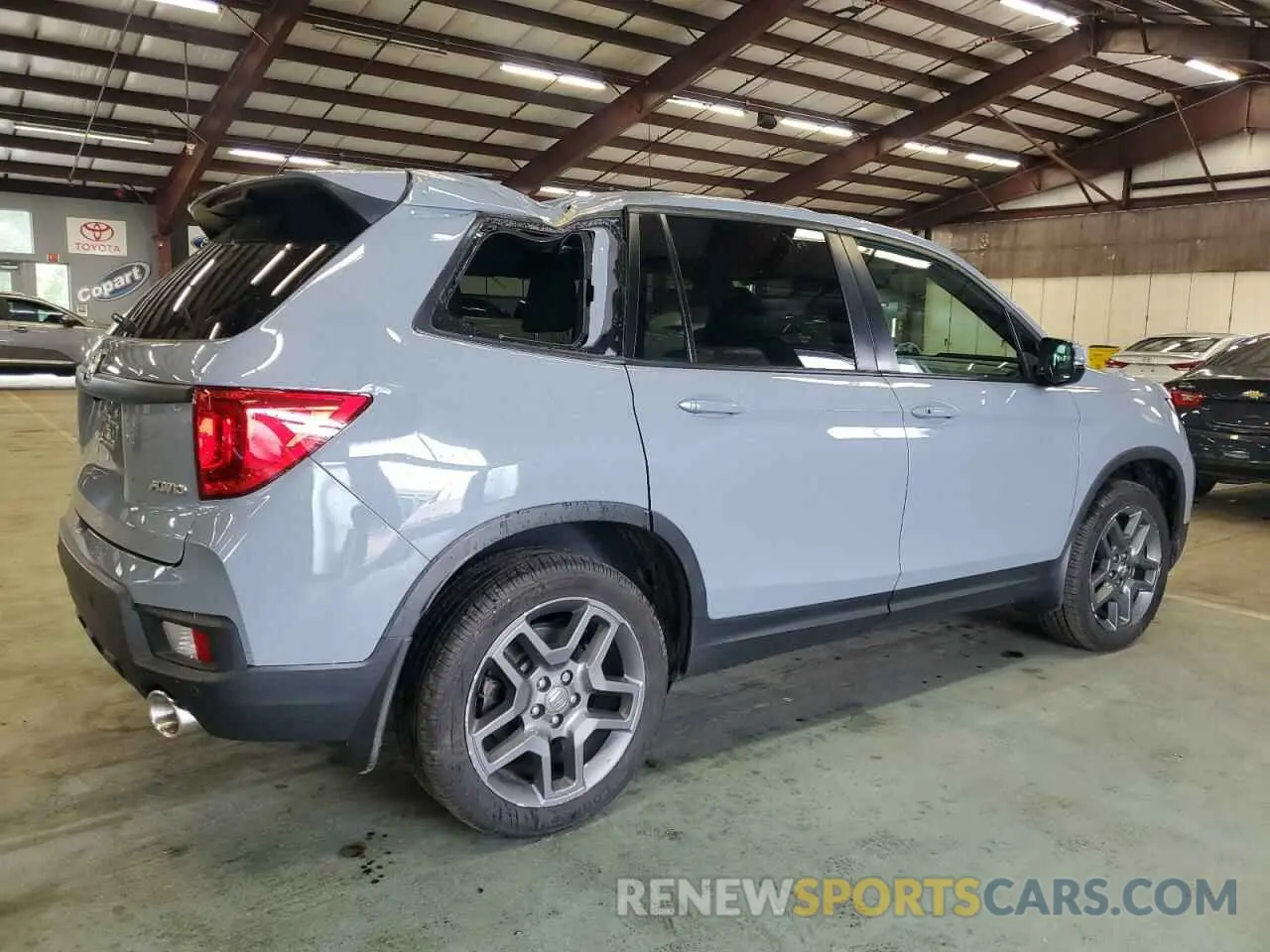 3 Photograph of a damaged car 5FNYF8H59NB000975 HONDA PASSPORT 2022