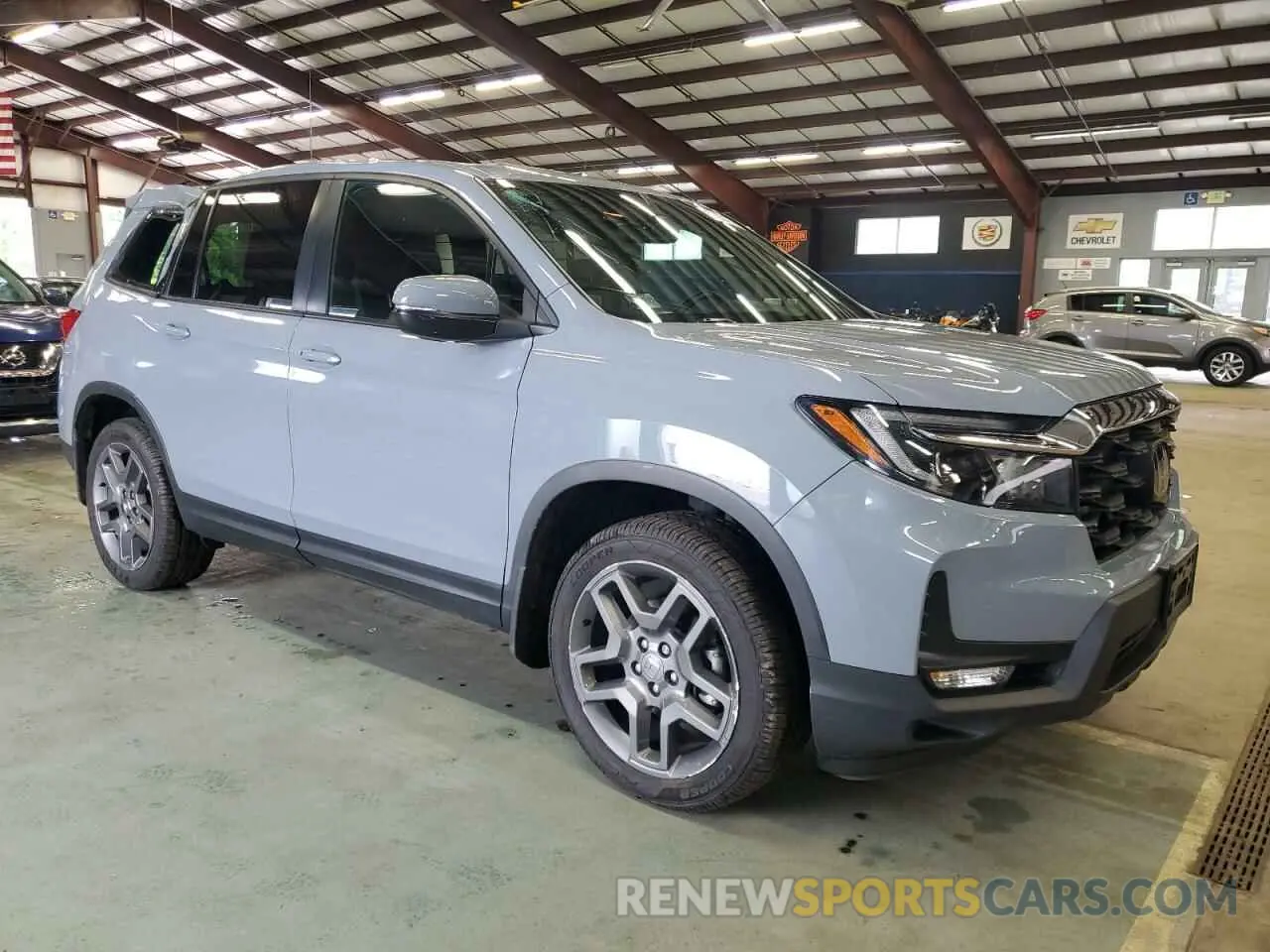 4 Photograph of a damaged car 5FNYF8H59NB000975 HONDA PASSPORT 2022