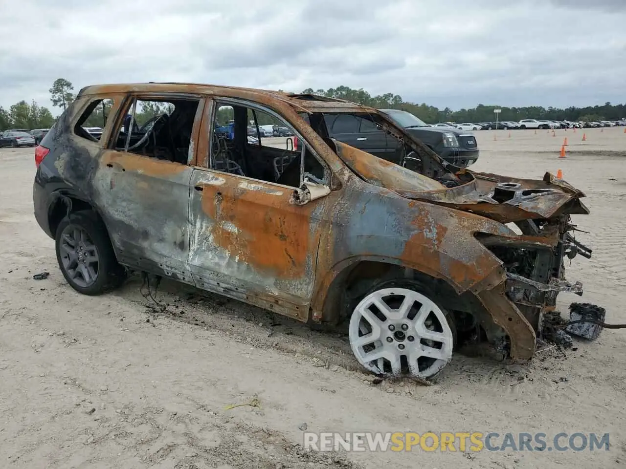 4 Фотография поврежденного автомобиля 5FNYF8H59NB017484 HONDA PASSPORT 2022