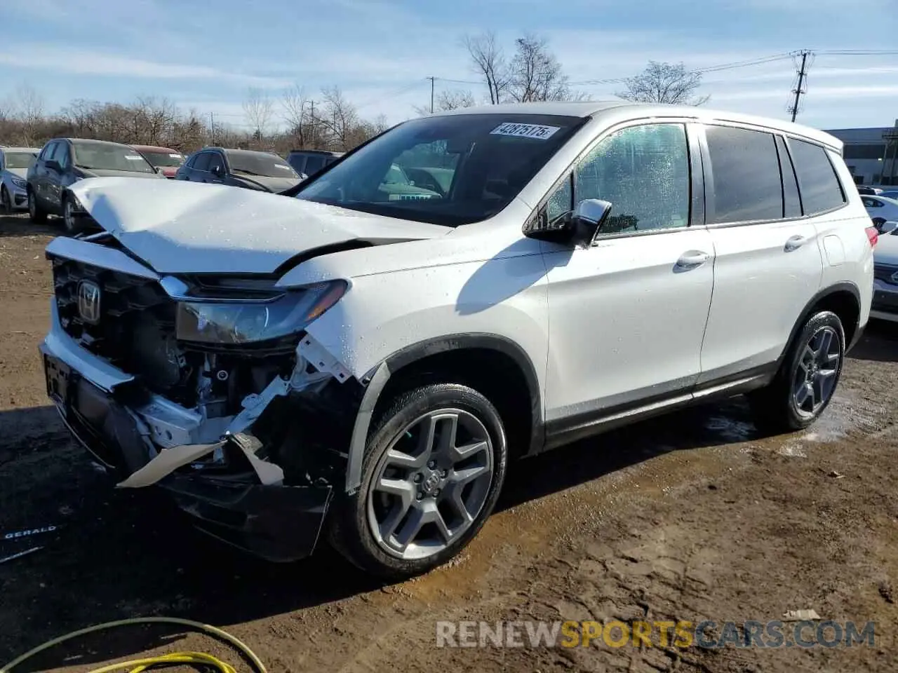 1 Фотография поврежденного автомобиля 5FNYF8H5XNB022371 HONDA PASSPORT 2022