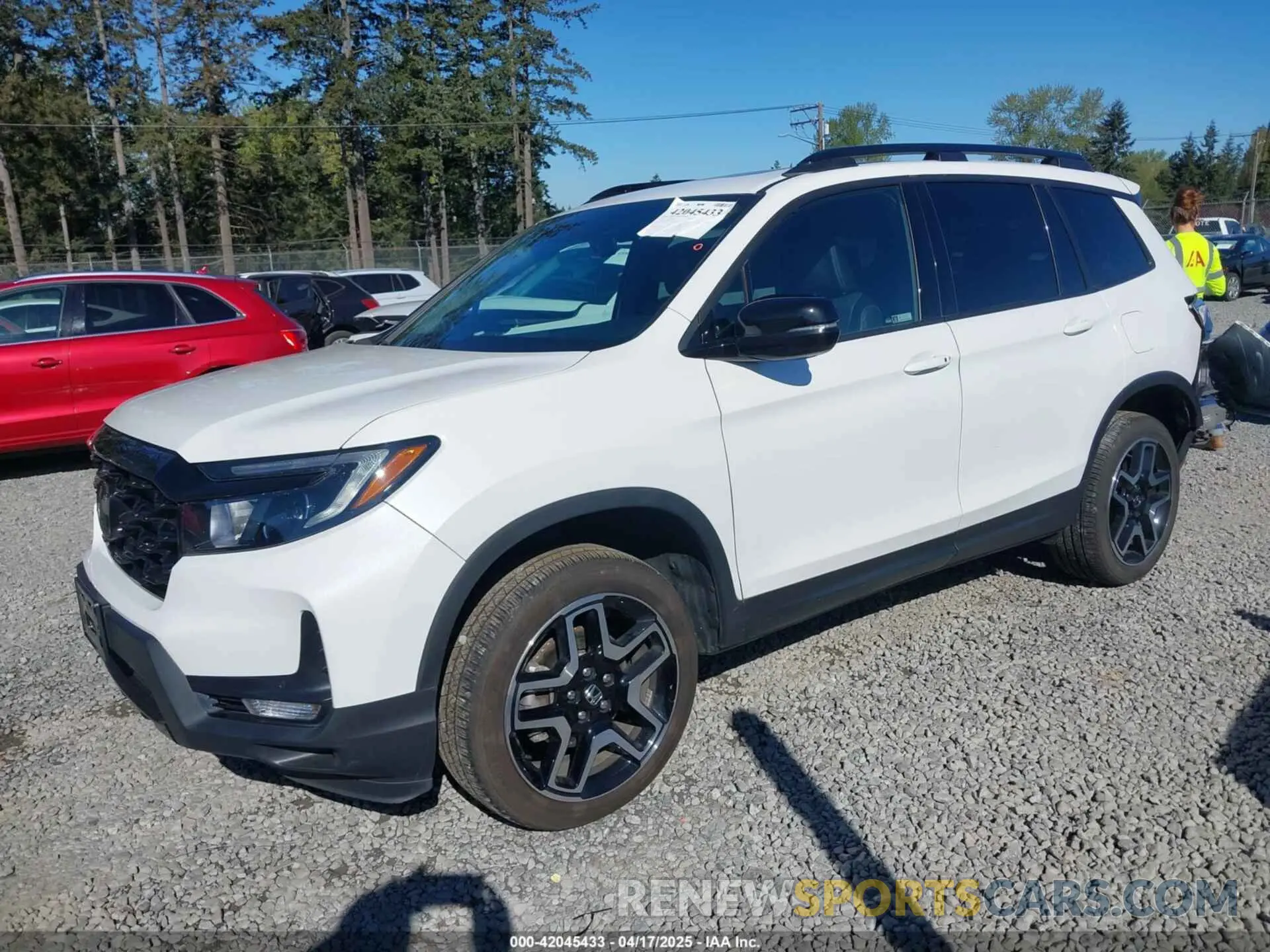 2 Фотография поврежденного автомобиля 5FNYF8H01PB004087 HONDA PASSPORT 2023