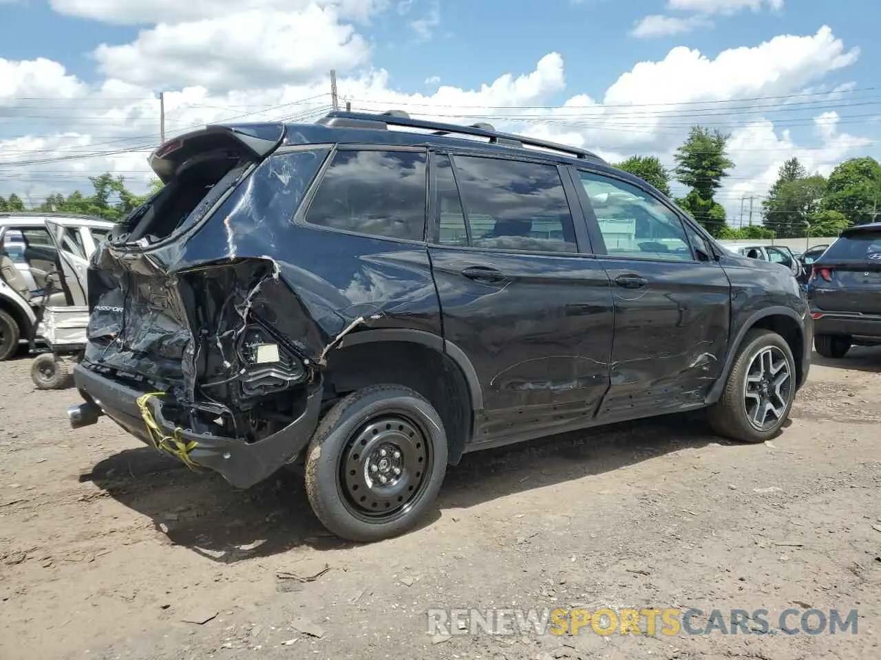 3 Photograph of a damaged car 5FNYF8H01PB030270 HONDA PASSPORT 2023