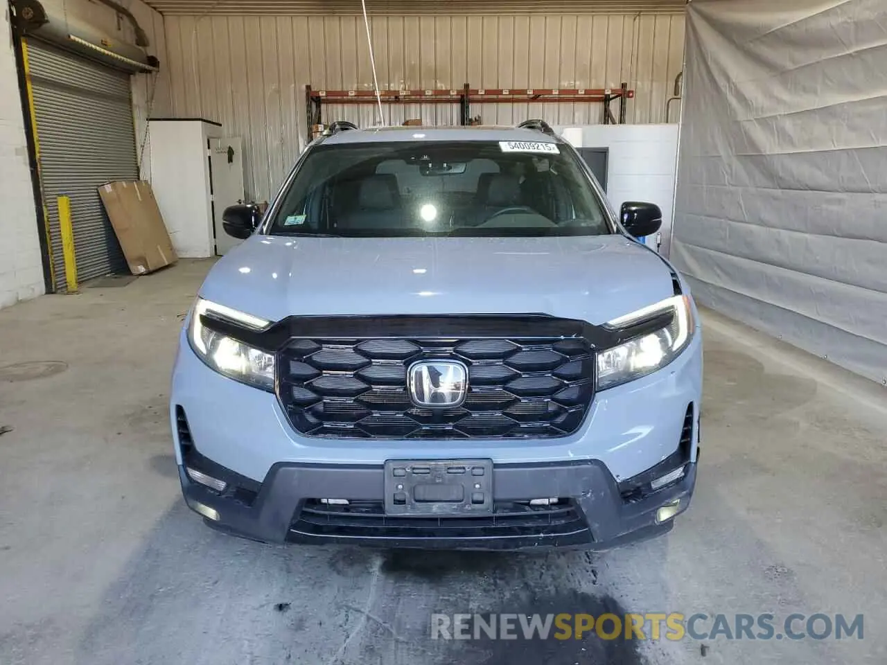 5 Фотография поврежденного автомобиля 5FNYF8H03PB034613 HONDA PASSPORT 2023