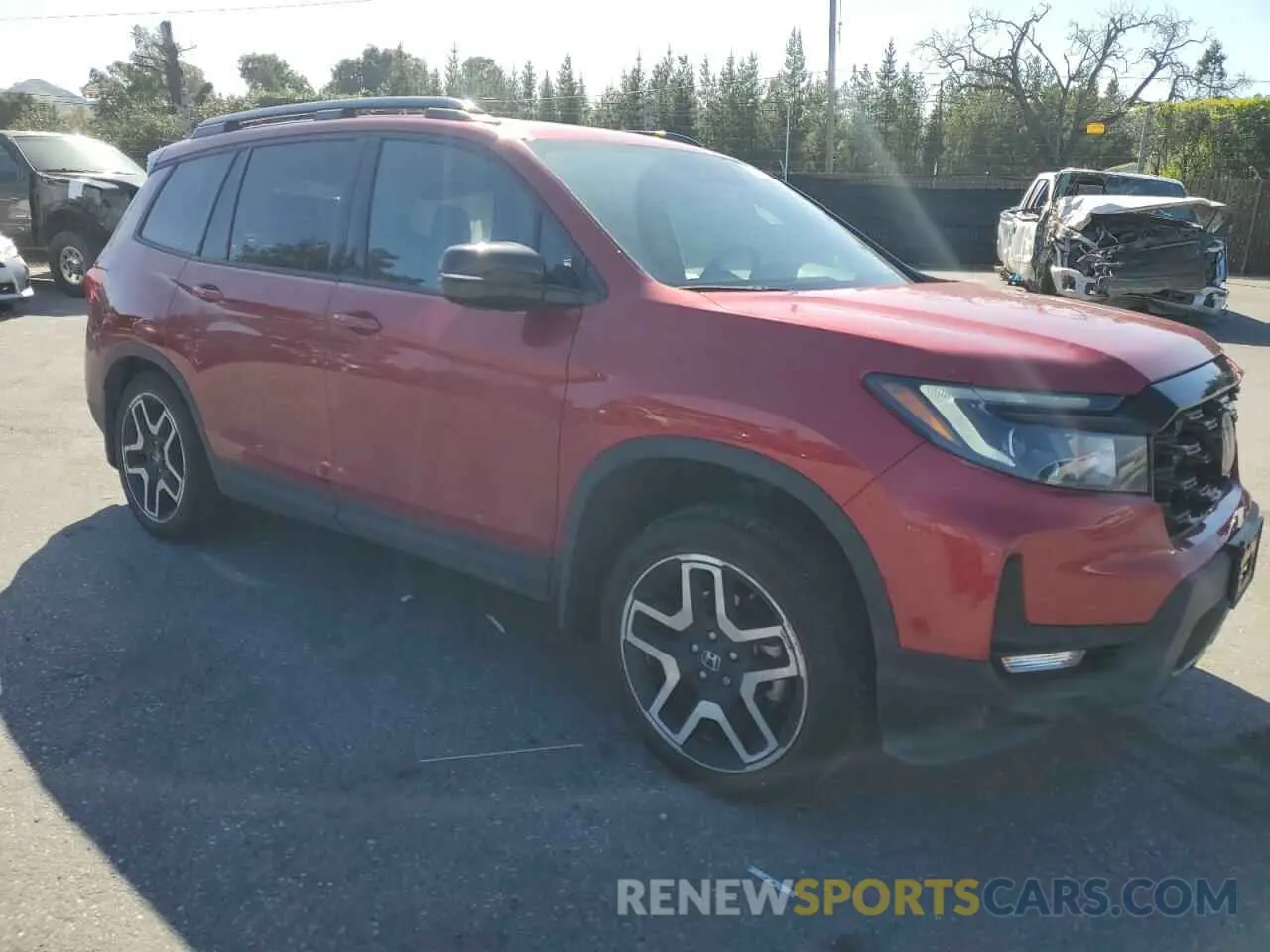 4 Photograph of a damaged car 5FNYF8H06PB013044 HONDA PASSPORT 2023