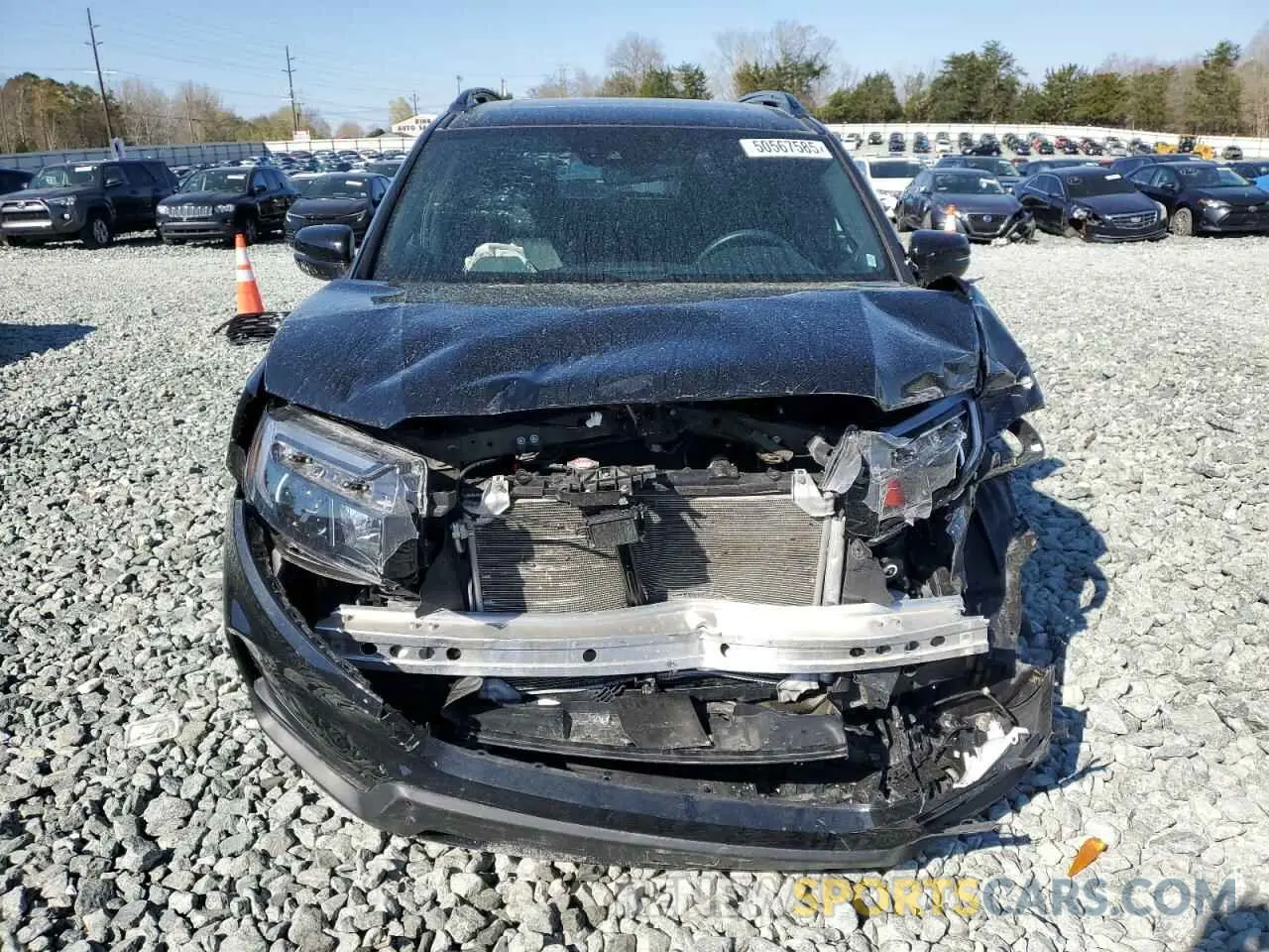 5 Photograph of a damaged car 5FNYF8H0XPB034110 HONDA PASSPORT 2023
