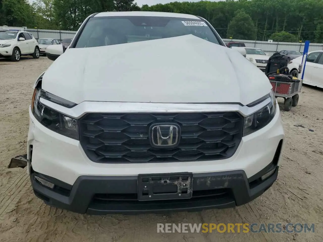5 Photograph of a damaged car 5FNYF8H51PB033343 HONDA PASSPORT 2023