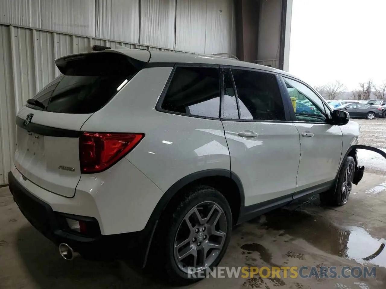 3 Фотография поврежденного автомобиля 5FNYF8H52PB000514 HONDA PASSPORT 2023