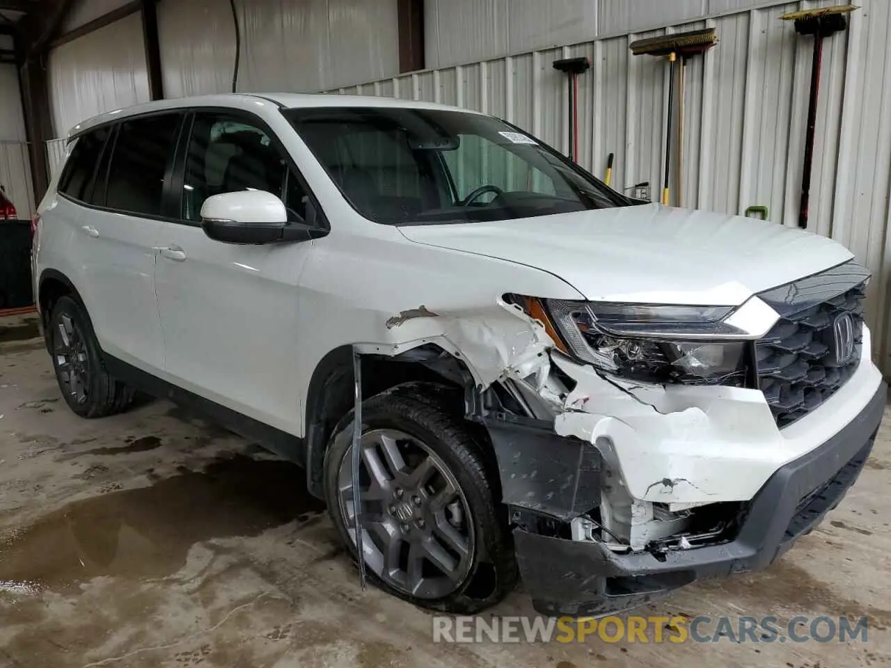 4 Фотография поврежденного автомобиля 5FNYF8H52PB000514 HONDA PASSPORT 2023