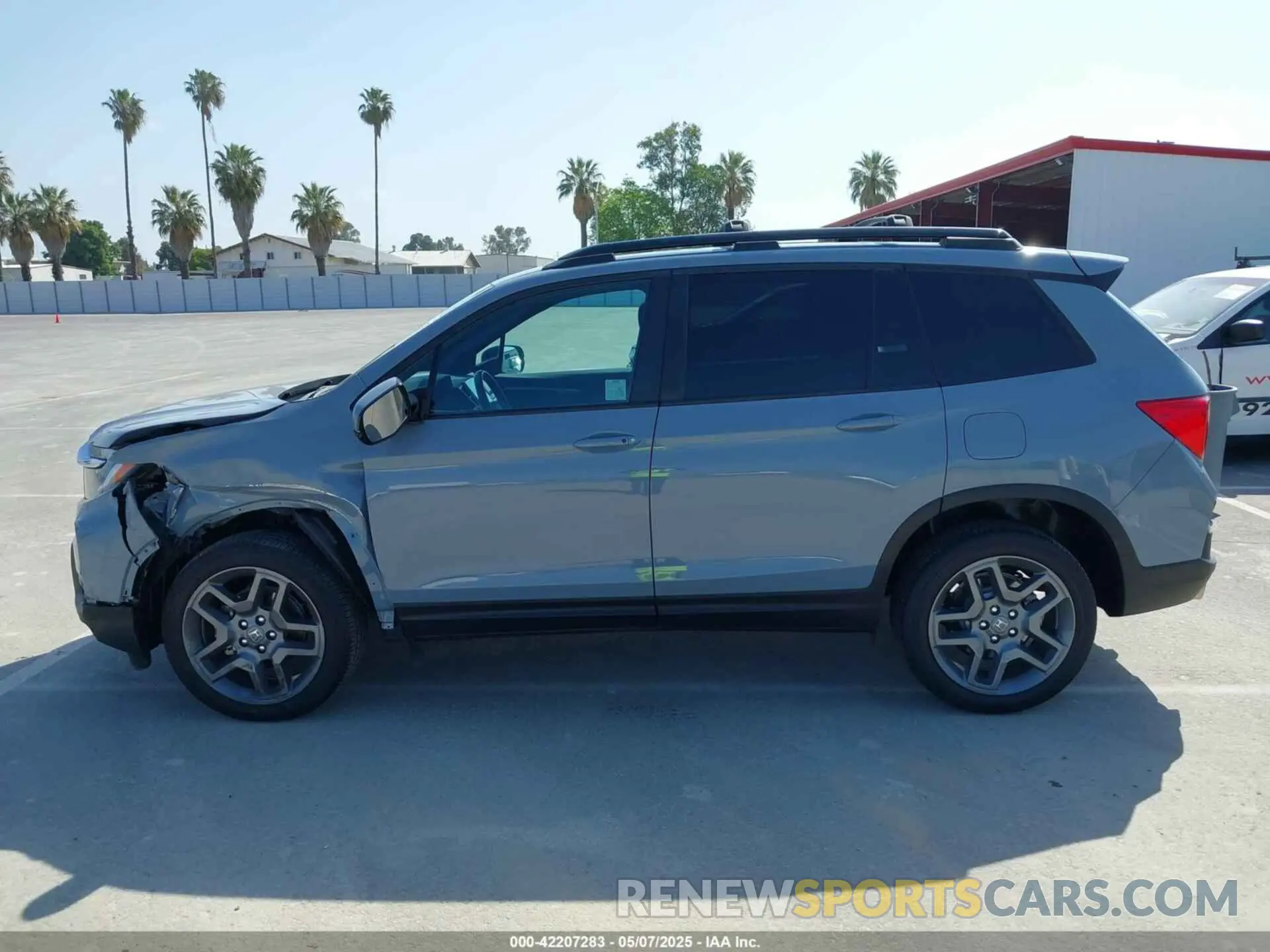 14 Photograph of a damaged car 5FNYF8H54PB008940 HONDA PASSPORT 2023