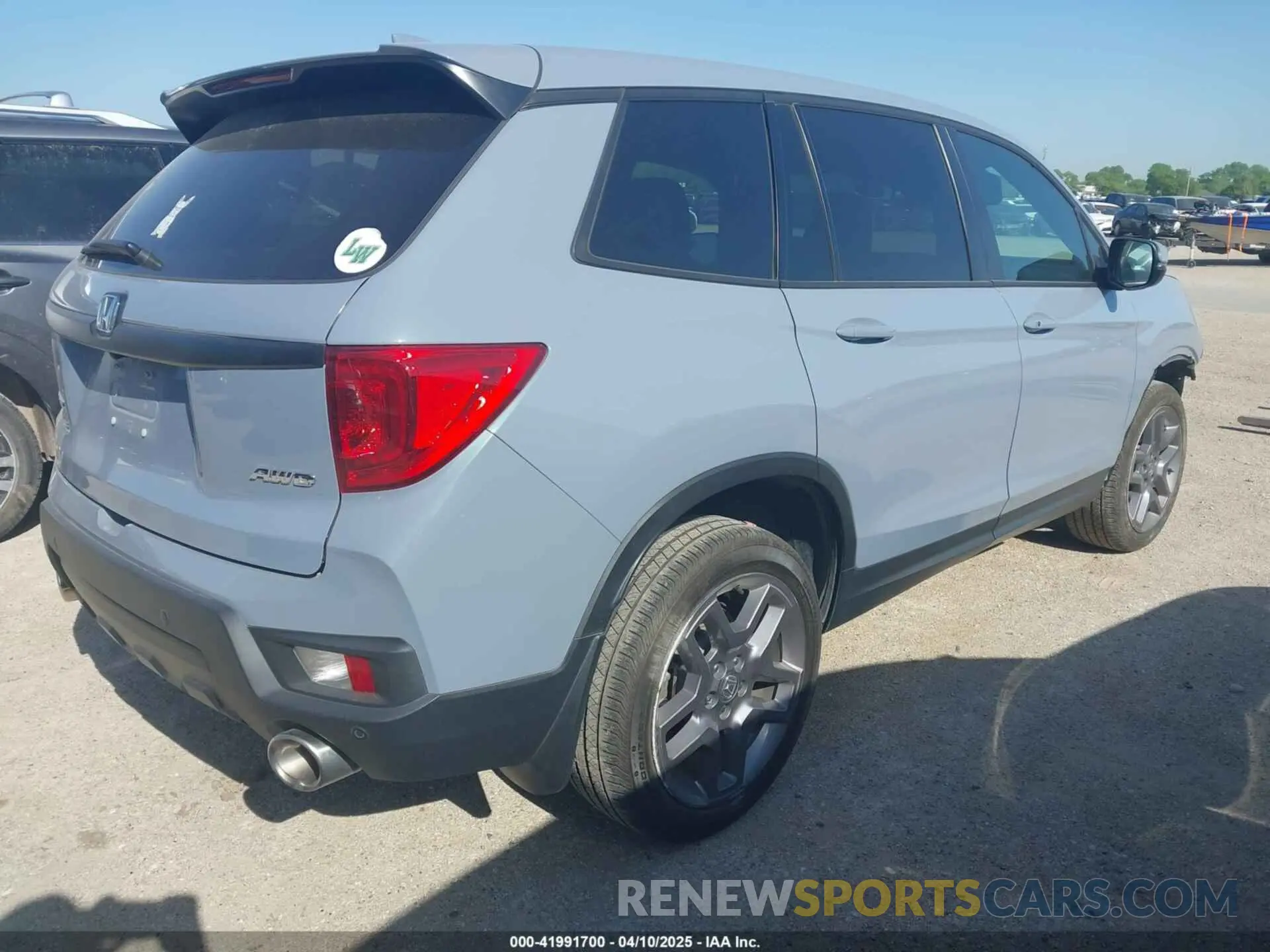 4 Photograph of a damaged car 5FNYF8H54PB036477 HONDA PASSPORT 2023