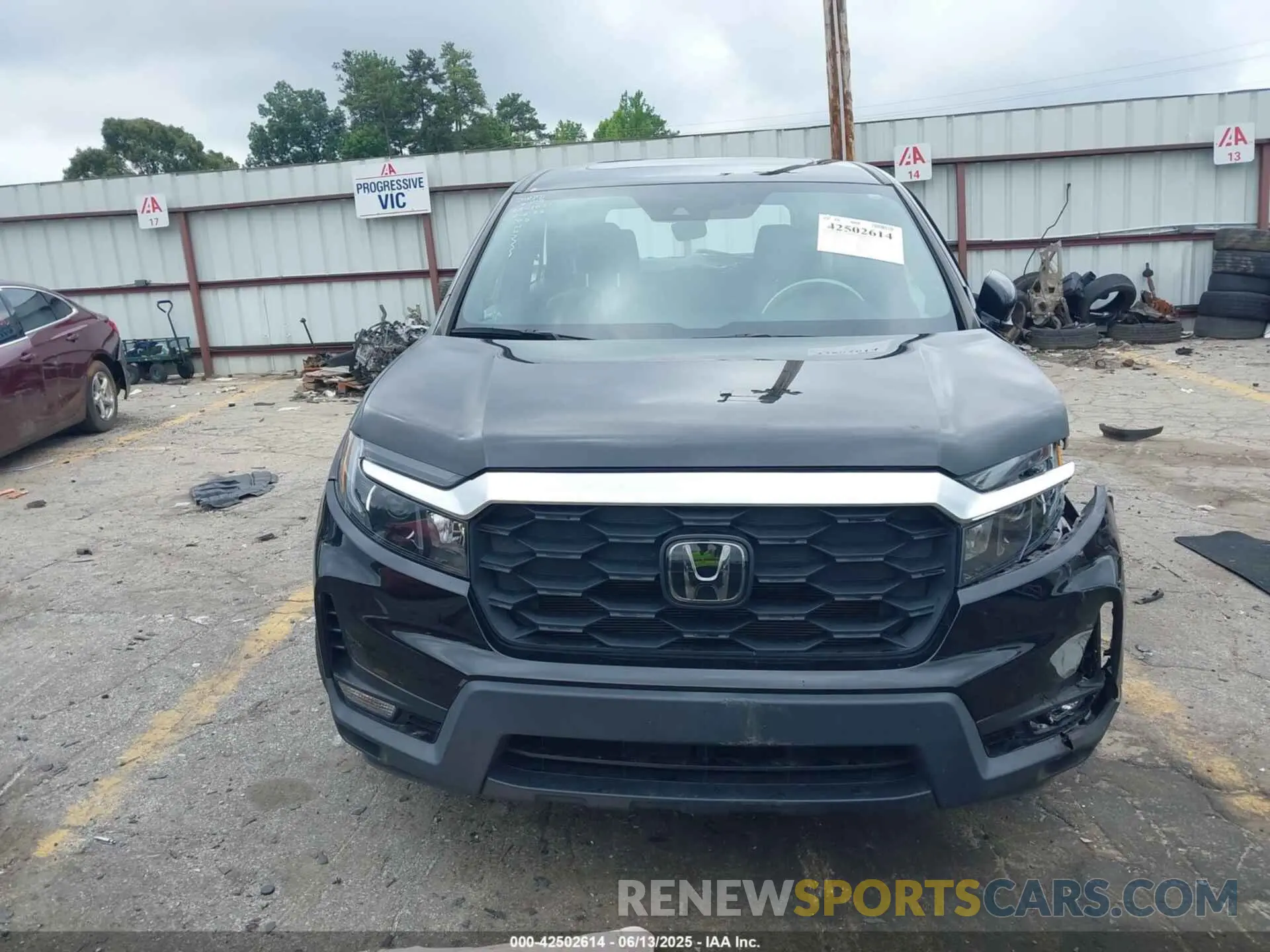 11 Photograph of a damaged car 5FNYF8H56PB009779 HONDA PASSPORT 2023