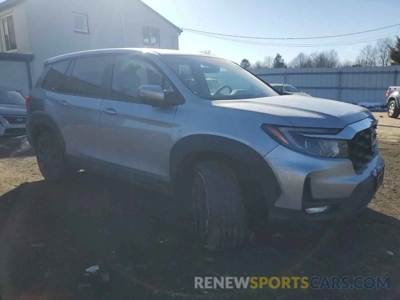 4 Photograph of a damaged car 5FNYF8H56PB037064 HONDA PASSPORT 2023