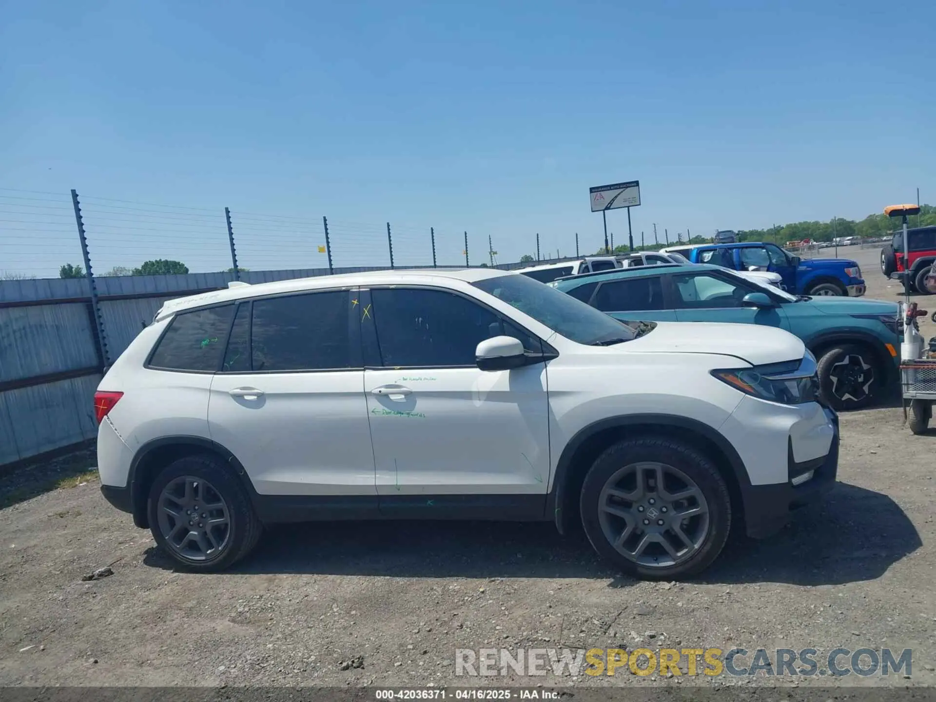 14 Photograph of a damaged car 5FNYF8H57PB006499 HONDA PASSPORT 2023