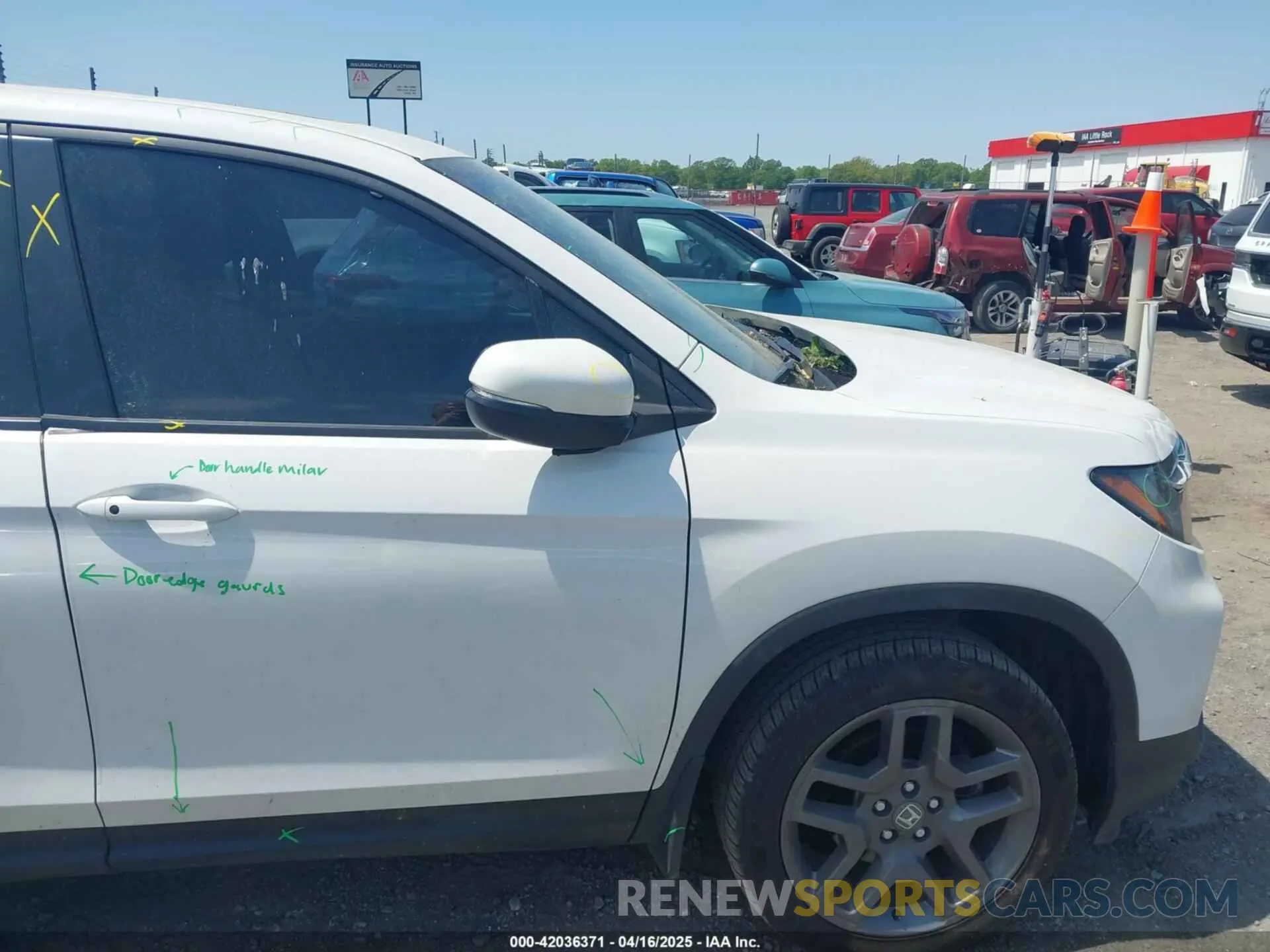 22 Photograph of a damaged car 5FNYF8H57PB006499 HONDA PASSPORT 2023