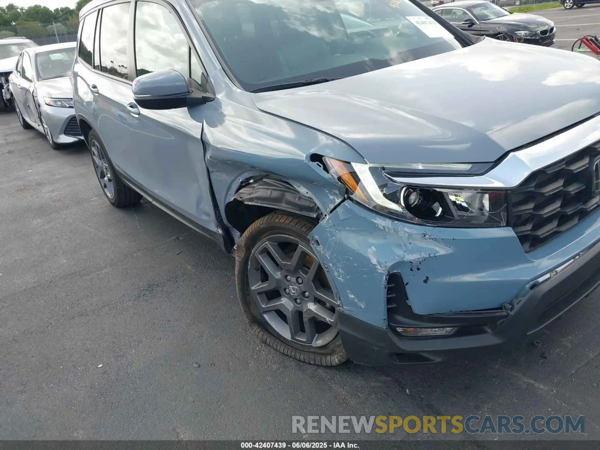 6 Photograph of a damaged car 5FNYF8H57PB020516 HONDA PASSPORT 2023