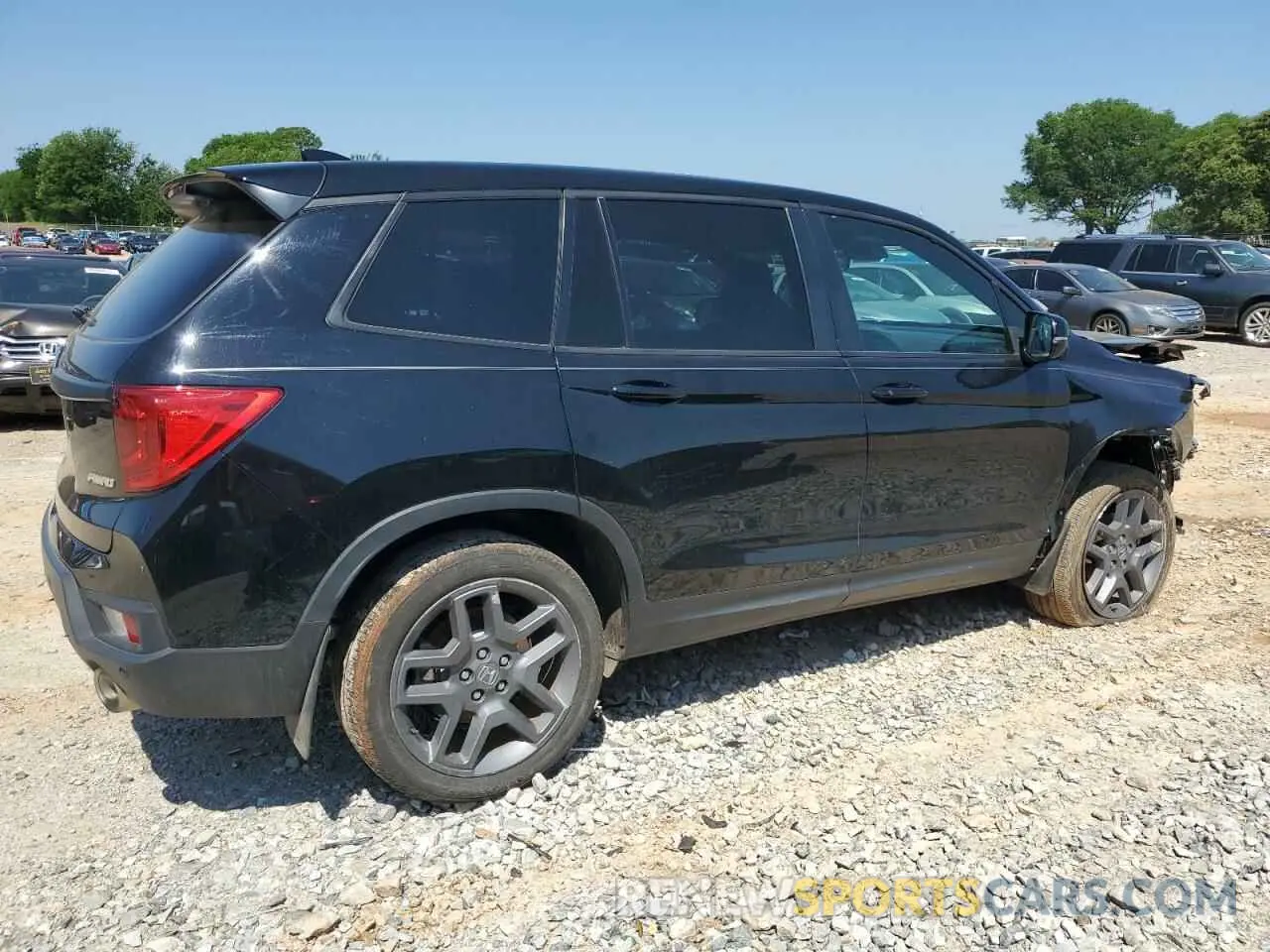 3 Photograph of a damaged car 5FNYF8H57PB020614 HONDA PASSPORT 2023