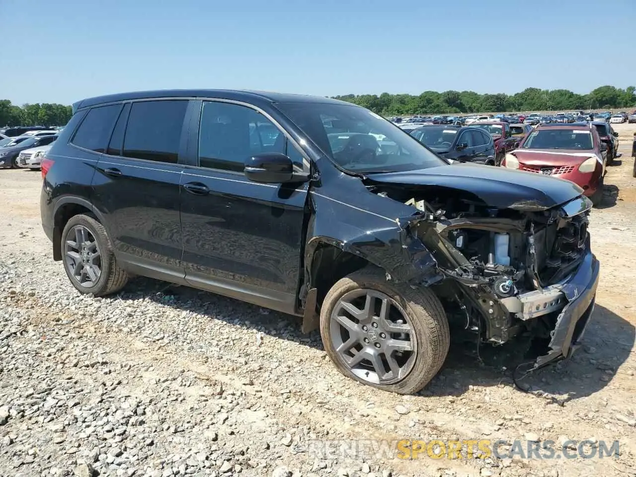 4 Photograph of a damaged car 5FNYF8H57PB020614 HONDA PASSPORT 2023