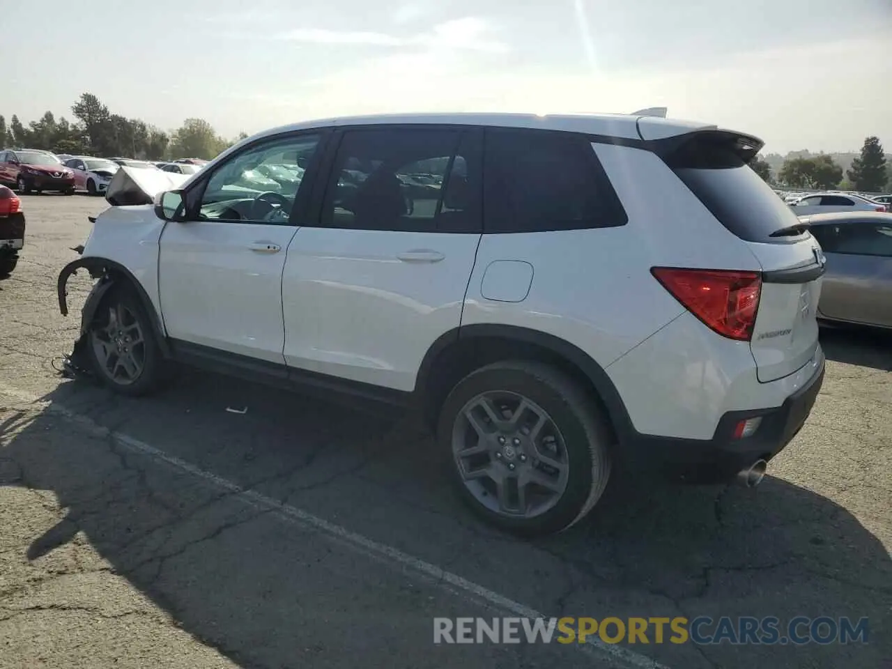 2 Photograph of a damaged car 5FNYF8H58PB014241 HONDA PASSPORT 2023