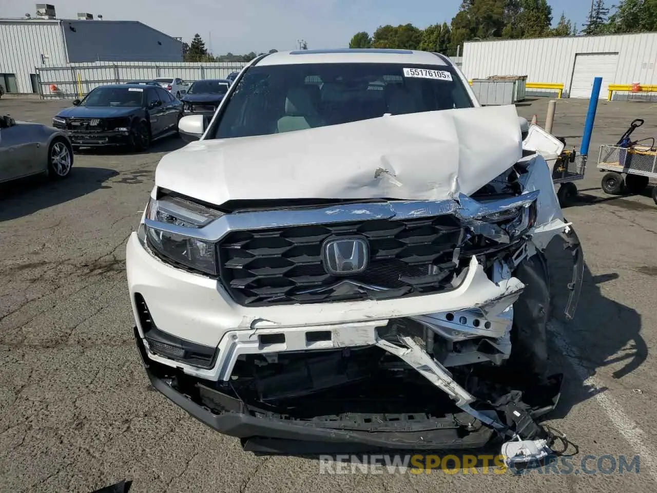 5 Photograph of a damaged car 5FNYF8H58PB014241 HONDA PASSPORT 2023