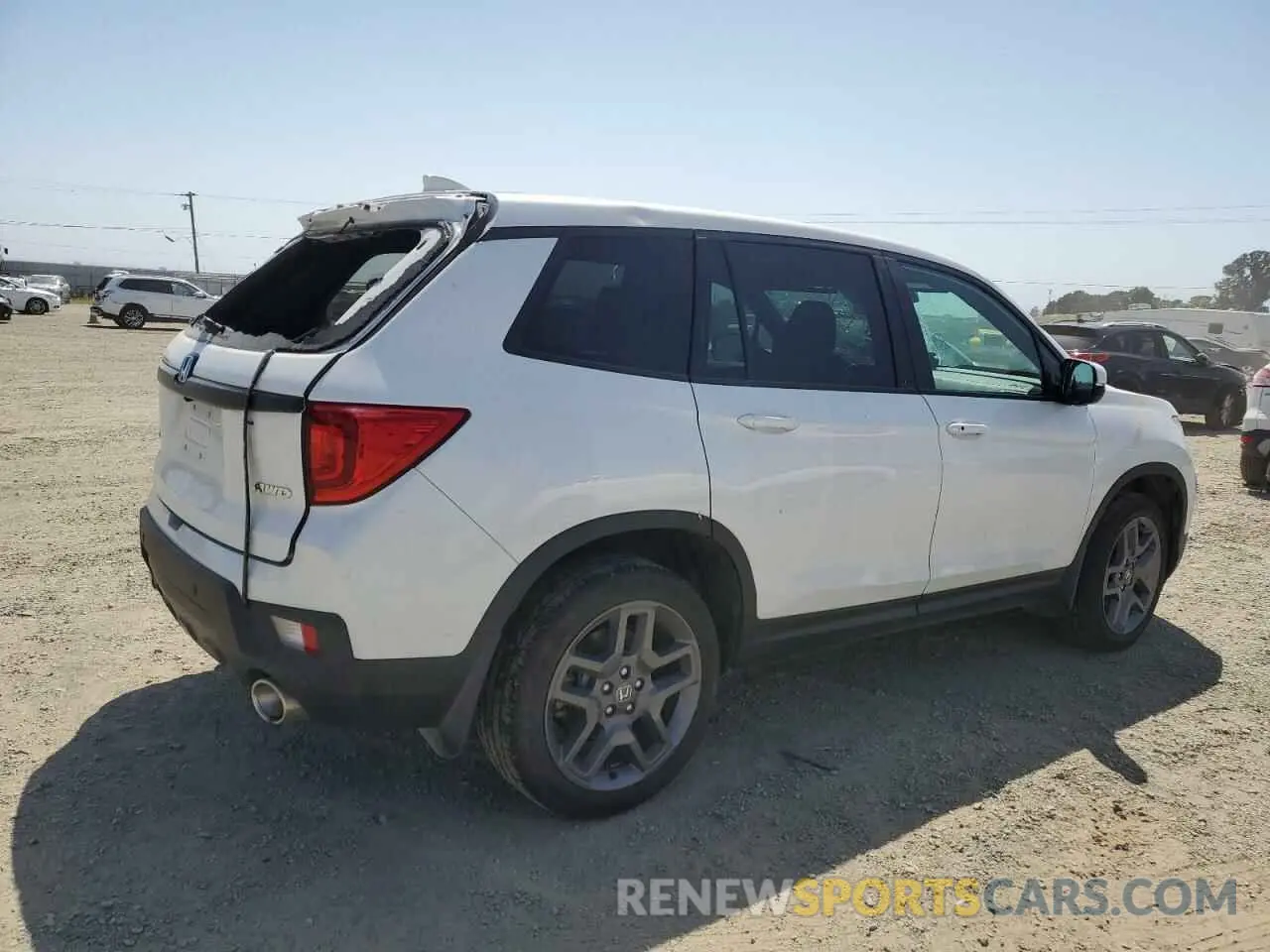 3 Photograph of a damaged car 5FNYF8H59PB010280 HONDA PASSPORT 2023